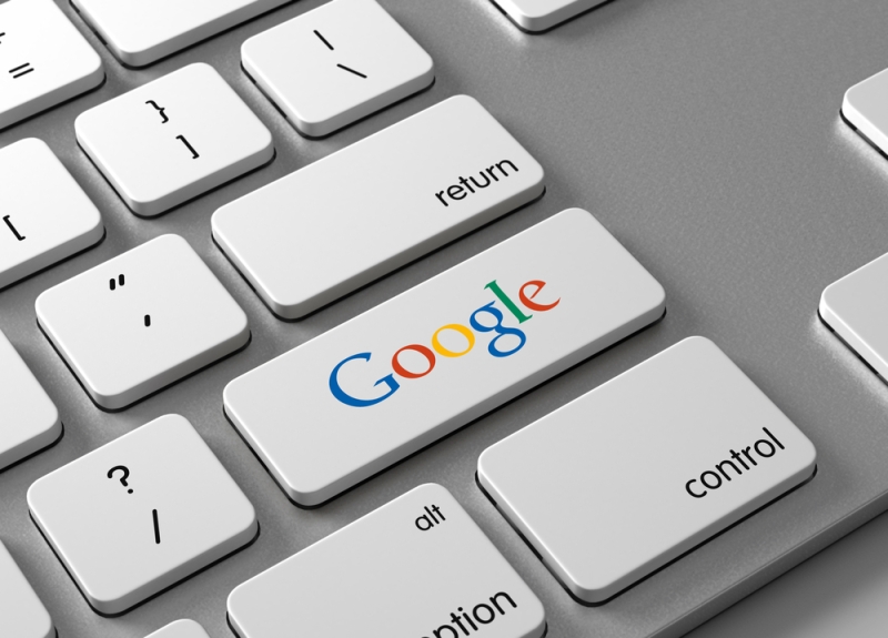 Keyboard with Google logo for a shift key.